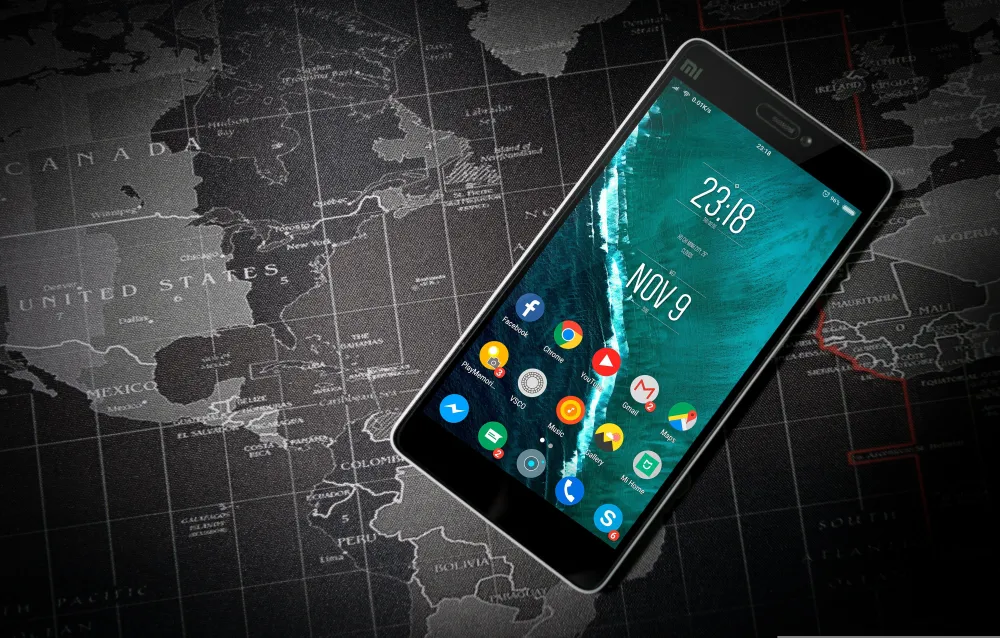 Smartphone and digital map representing modern technology